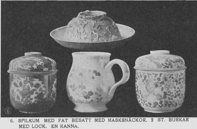 6. Spilkum med fat besatt med masksnäckor